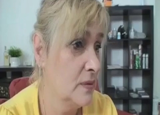 Mother gives her son some pleasure